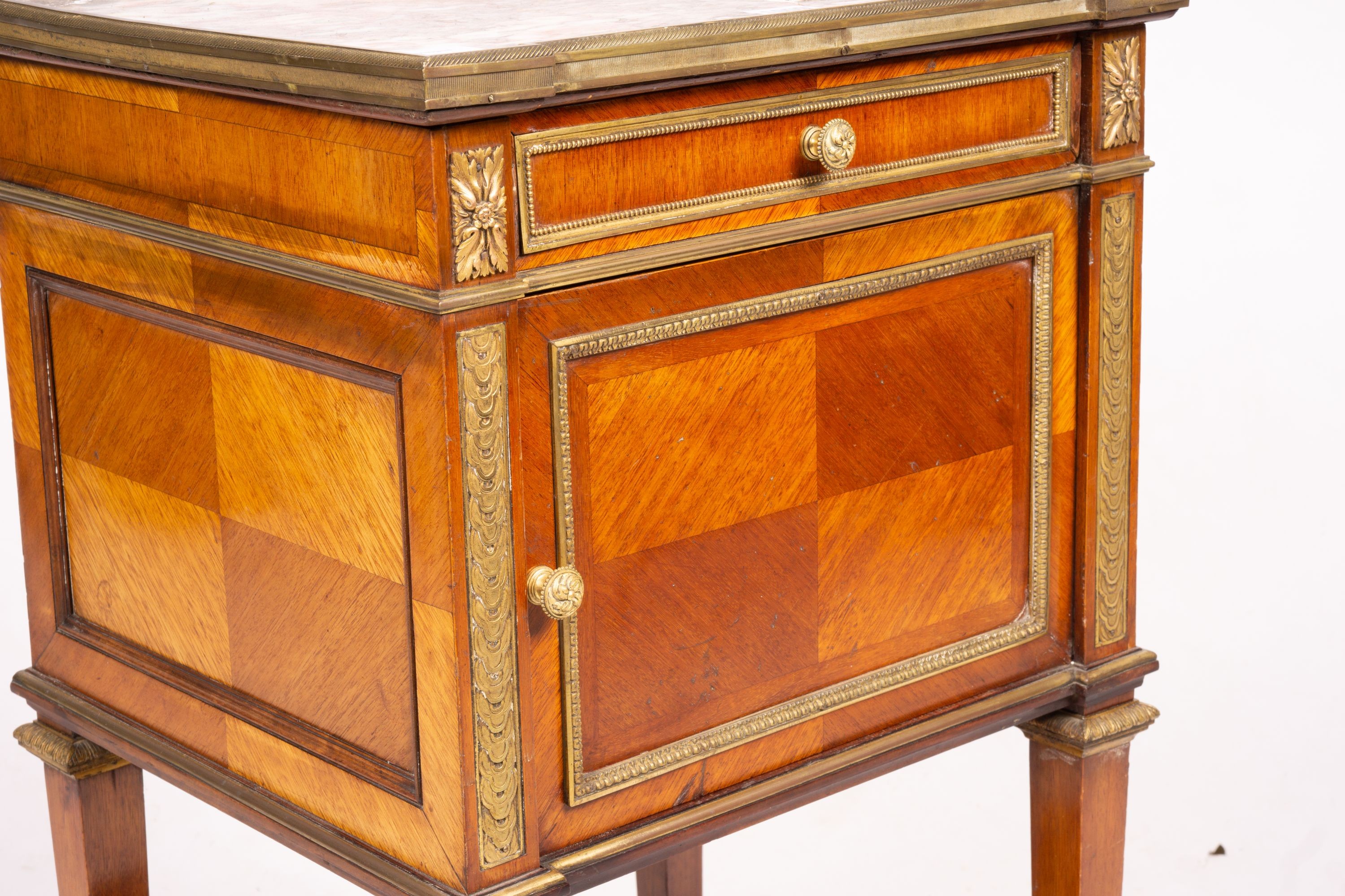 An early 20th century French marble top mahogany bedside cabinet, width 42cm, depth 38cm, height 75cm